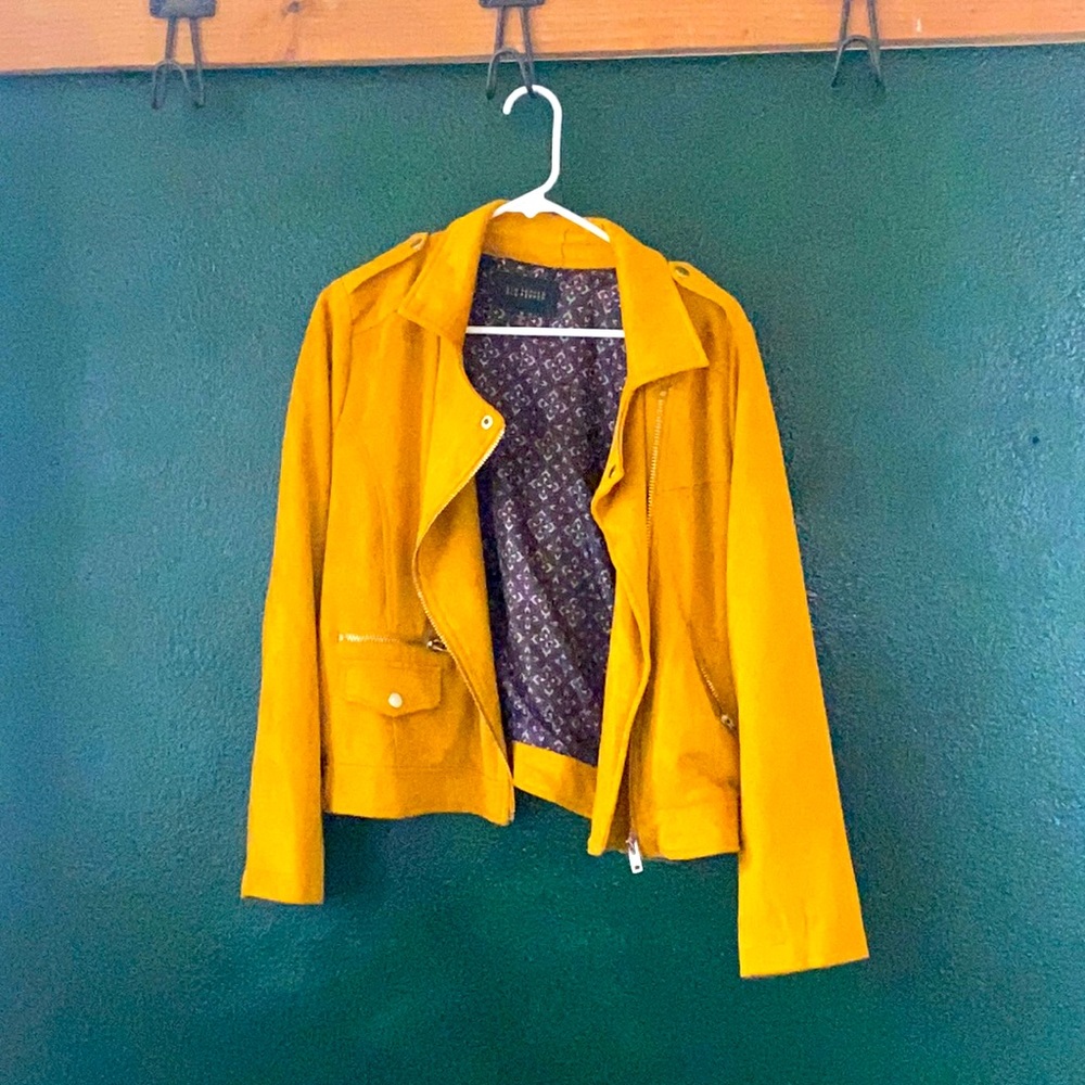 Mustard yellow jacket.